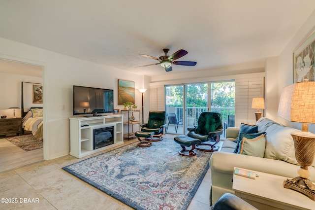 tiled living room with ceiling fan