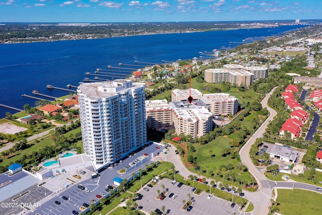 drone / aerial view with a water view