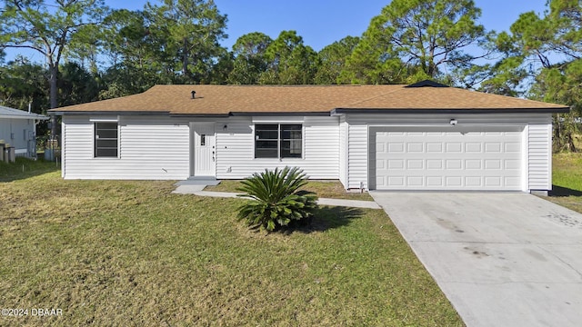 single story home featuring a front lawn and a garage