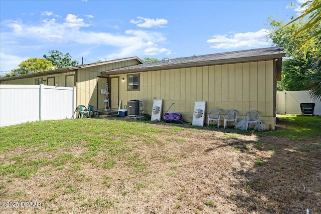 644 Lpga Blvd Unit A, Daytona Beach, FL 32117 - rear view of house featuring cooling unit