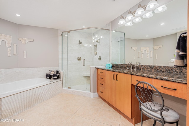 bathroom featuring tile patterned flooring, vanity, and independent shower and bath