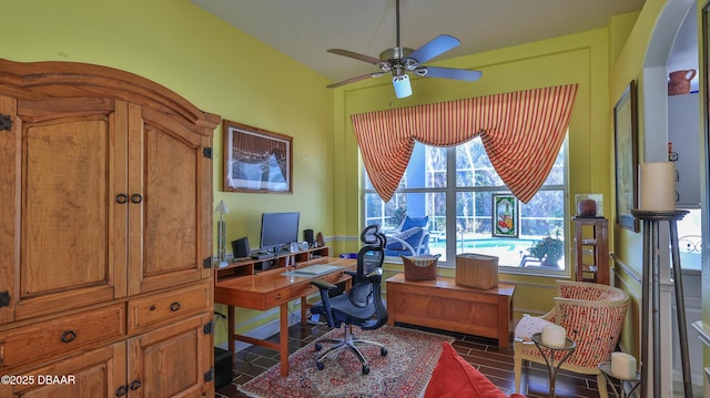 office space with ceiling fan