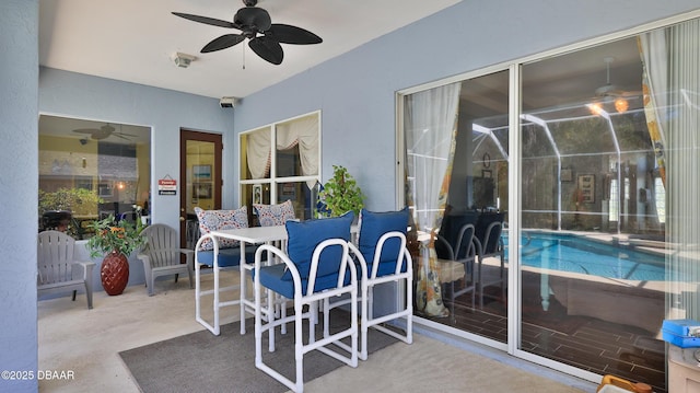 view of patio / terrace featuring a ceiling fan