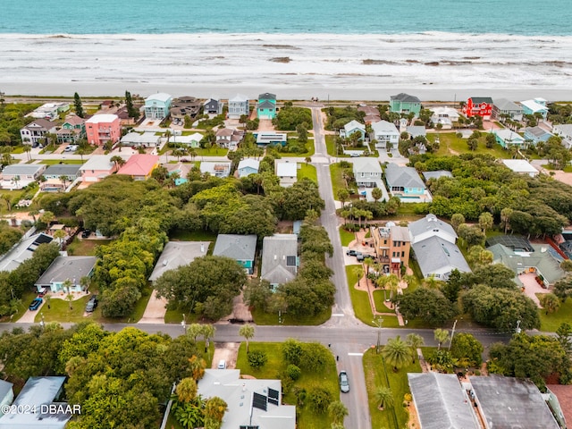 bird's eye view featuring a beach view and a water view