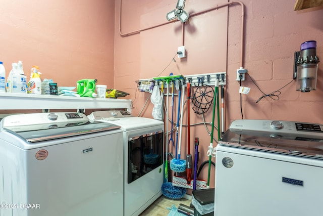 washroom featuring independent washer and dryer