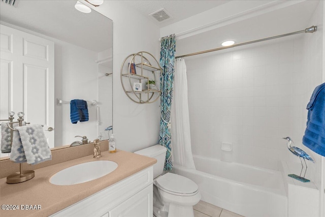 full bathroom with vanity, shower / tub combo with curtain, tile patterned flooring, and toilet