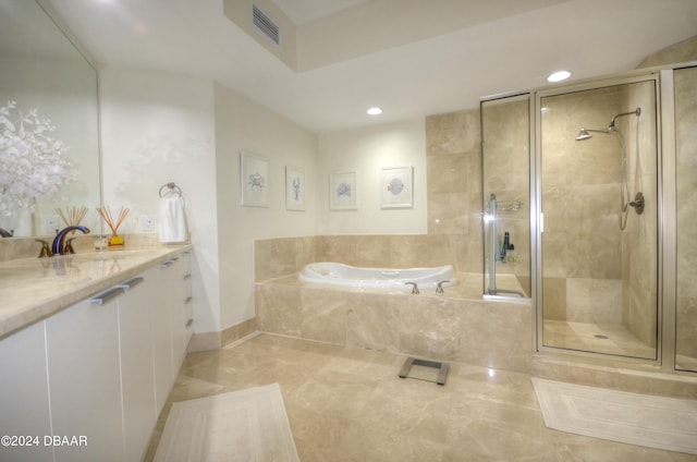 bathroom with vanity, tile patterned floors, and separate shower and tub