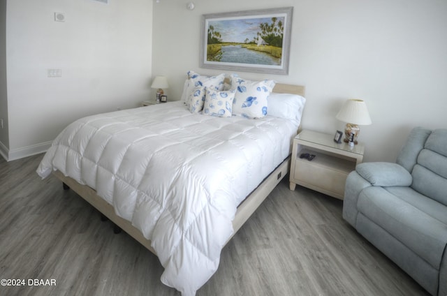 bedroom featuring hardwood / wood-style flooring