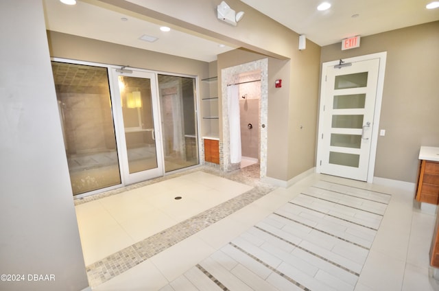 bathroom with tile patterned flooring