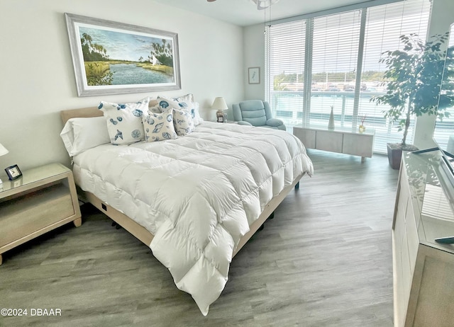 bedroom with wood-type flooring