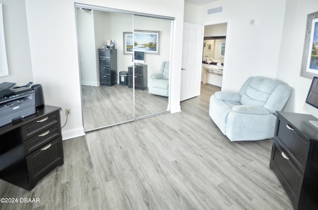 home office featuring light hardwood / wood-style floors