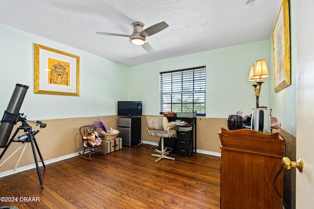 office space with a textured ceiling, dark hardwood / wood-style floors, and ceiling fan