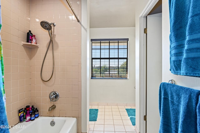 bathroom with tile patterned floors and shower / bathtub combination with curtain