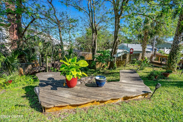 view of yard with a deck