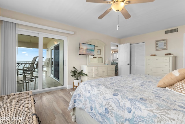 bedroom featuring a closet, access to exterior, ceiling fan, and light hardwood / wood-style flooring