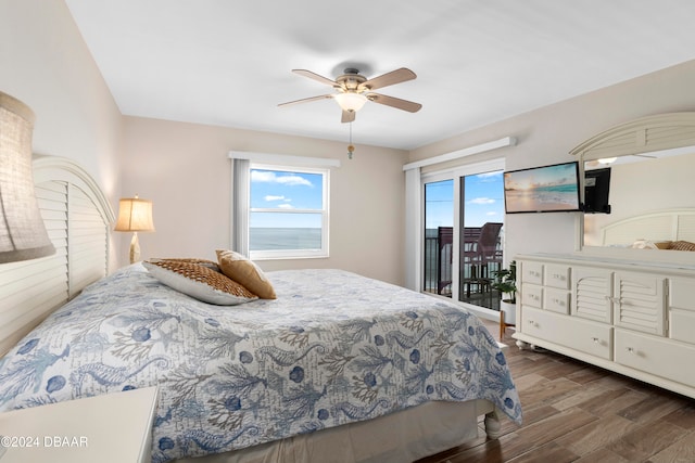 bedroom featuring ceiling fan and dark hardwood / wood-style floors