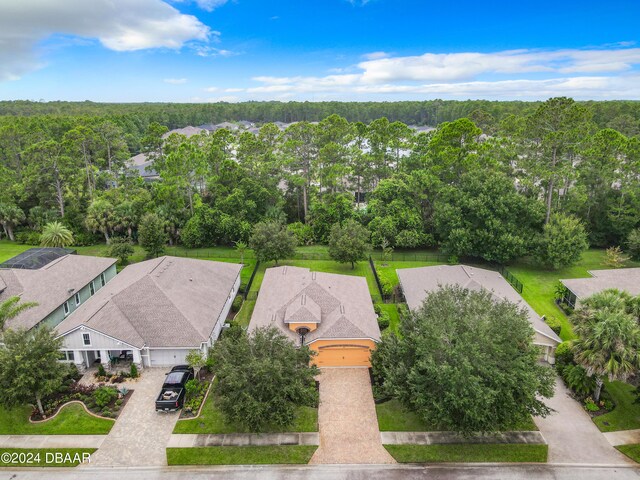 645 Elk River Dr, Ormond Beach, FL 32174 - drone / aerial view featuring a forest view