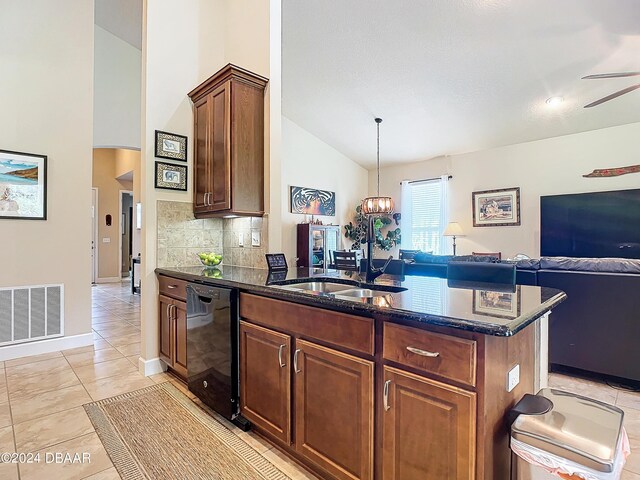 645 Elk River Dr, Ormond Beach, FL 32174 - kitchen featuring visible vents, backsplash, lofted ceiling, black dishwasher, and ceiling fan with notable chandelier