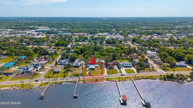 bird's eye view with a residential view and a water view