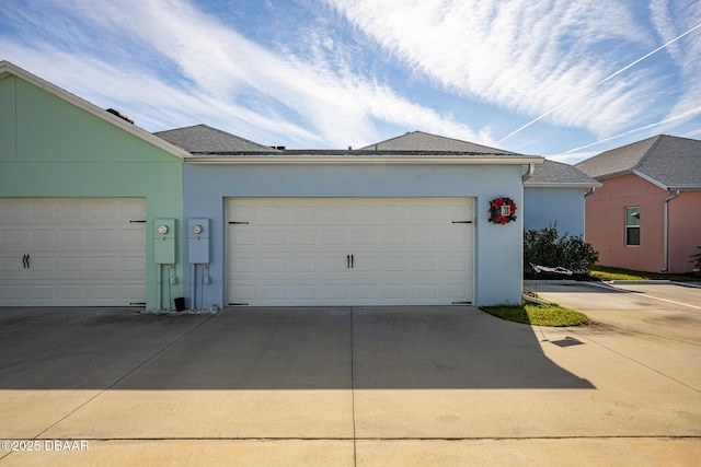613 Good Life Way, Daytona Beach, FL 32124 - view of front of home with stucco siding and driveway