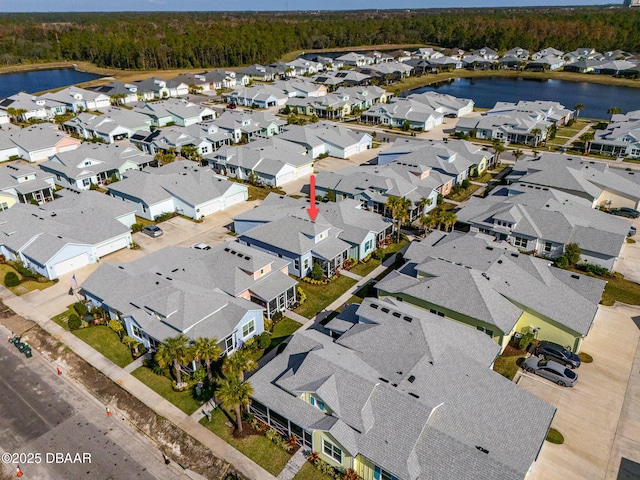 613 Good Life Way, Daytona Beach, FL 32124 - aerial perspective of suburban area featuring a large body of water and a heavily wooded area