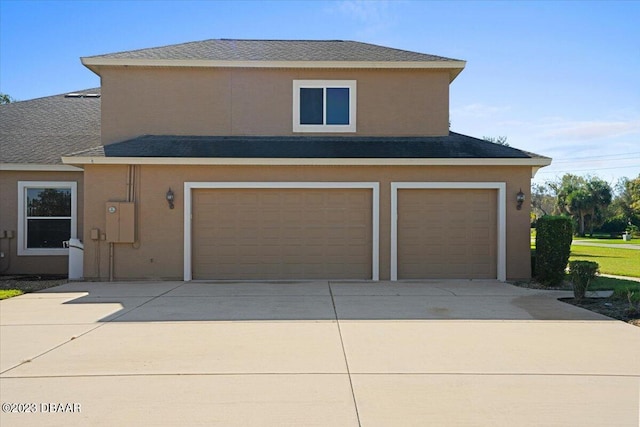 view of front of home with a garage