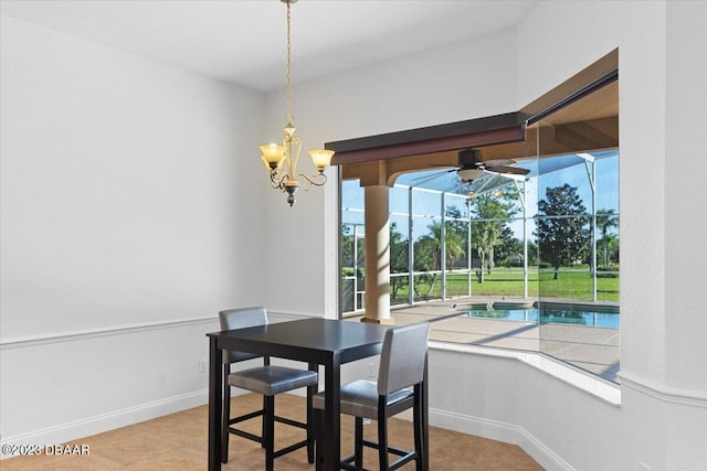 dining room featuring light tile patterned floors and a notable chandelier