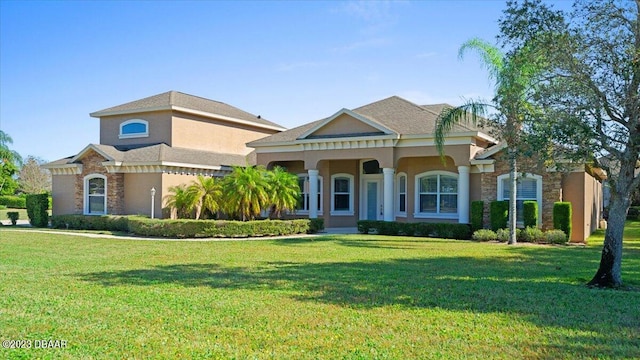 view of front facade with a front lawn