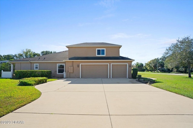 view of front of property featuring a garage and a front lawn