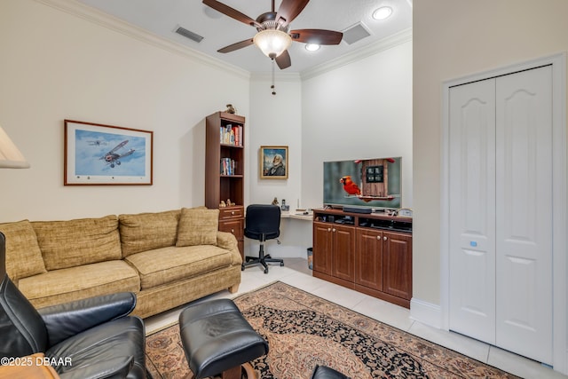 office area featuring ornamental molding, a ceiling fan, visible vents, and light tile patterned floors