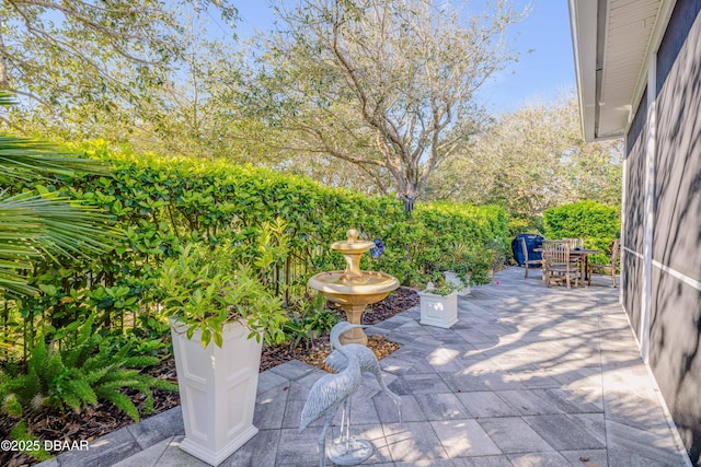 view of patio featuring outdoor dining area