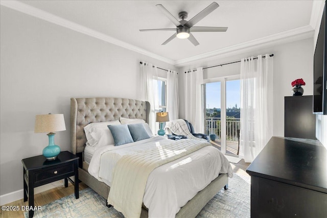 bedroom featuring access to outside, crown molding, ceiling fan, and hardwood / wood-style flooring