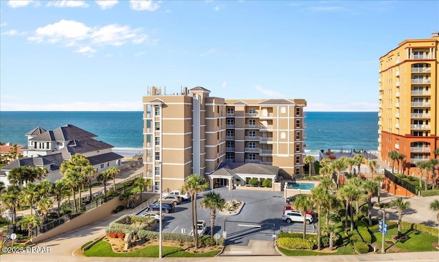 view of building exterior with a water view