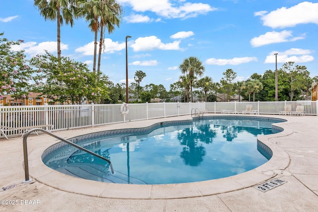4600 E Moody Blvd Unit 14-O, Bunnell, FL 32110 - community pool with a patio area