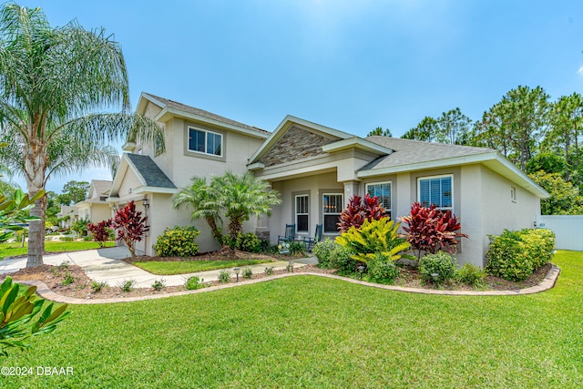 view of front of house with a front lawn