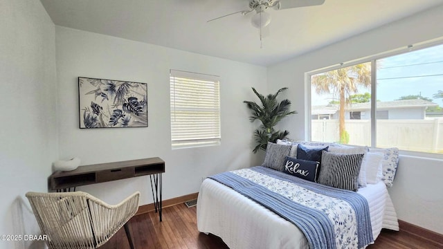 119 Rogers Park Dr, Ormond Beach, FL 32174 - bedroom with wood finished floors, baseboards, and ceiling fan