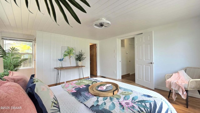 119 Rogers Park Dr, Ormond Beach, FL 32174 - bedroom featuring wood finished floors, wooden ceiling, and baseboards