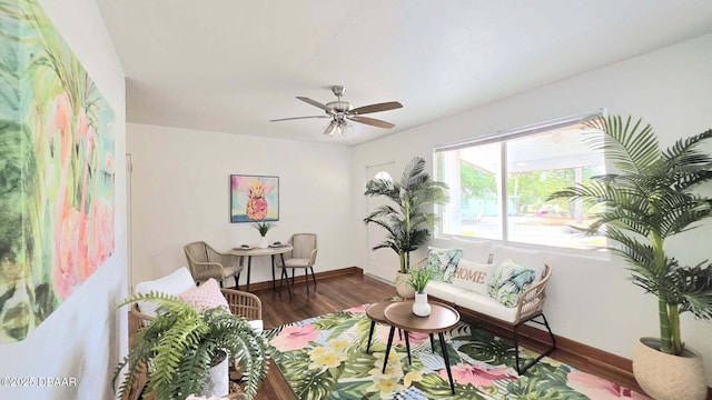 119 Rogers Park Dr, Ormond Beach, FL 32174 - sitting room with wood finished floors, baseboards, and a ceiling fan