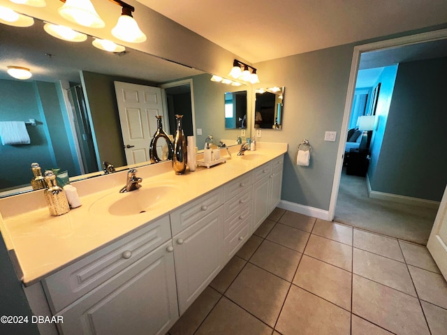 3145 S Atlantic Ave Unit 401, Daytona Beach, FL 32118 - bathroom featuring vanity and tile patterned flooring
