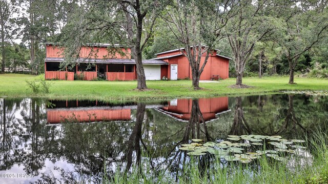 103 Cone Rd, Ormond Beach, FL 32174 - view of green lawn with a water view