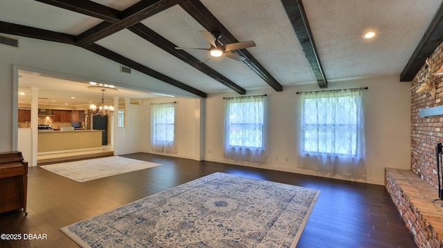 103 Cone Rd, Ormond Beach, FL 32174 - living area with a ceiling fan, dark wood-style flooring, a fireplace, a chandelier, and baseboards