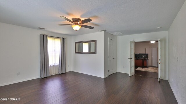 103 Cone Rd, Ormond Beach, FL 32174 - empty room featuring ceiling fan, dark wood-style floors, and baseboards