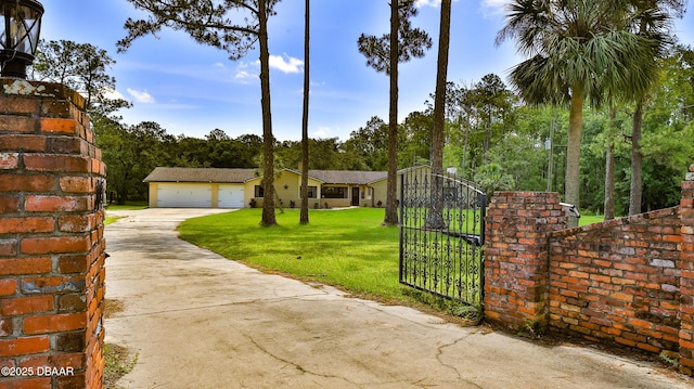 103 Cone Rd, Ormond Beach, FL 32174 - gate with a lawn