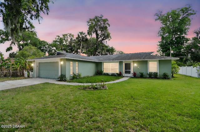 2421 Needle Palm Dr, Edgewater, FL 32141 - single story home featuring concrete driveway, a garage, and stucco siding