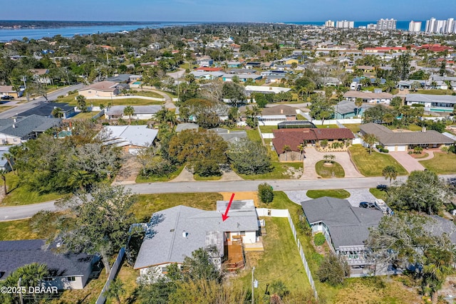 birds eye view of property featuring a water view