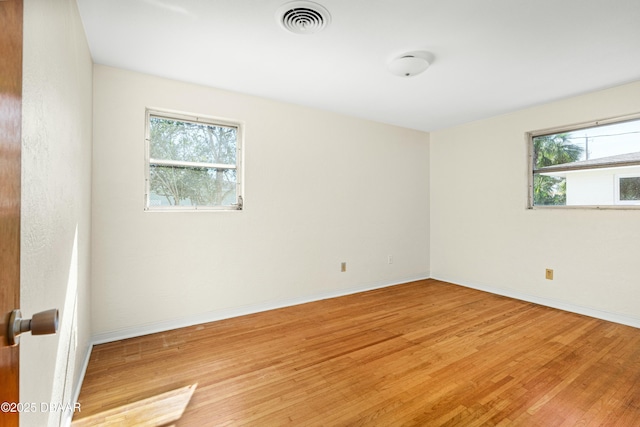 empty room featuring light wood-type flooring