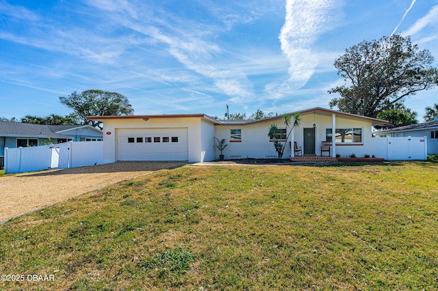 single story home with a garage, a porch, and a front yard