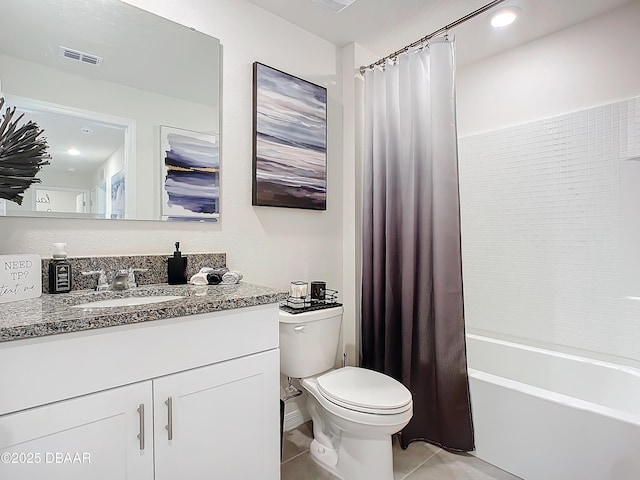 full bathroom with tile patterned flooring, shower / bath combination with curtain, vanity, and toilet