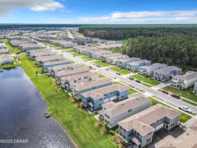 drone / aerial view featuring a water view