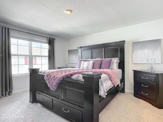 carpeted bedroom with a textured ceiling